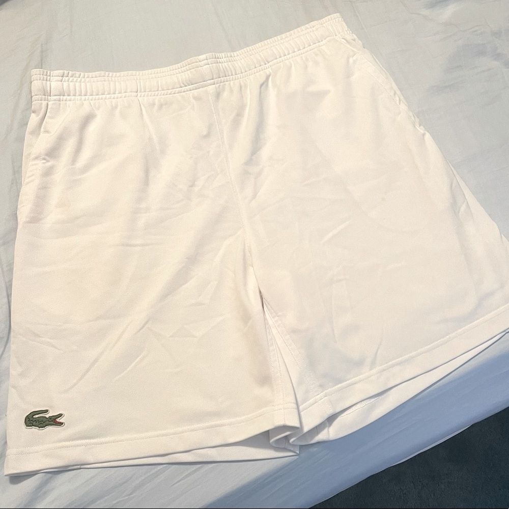 White Men’s Lacoste shorts with pockets size 6